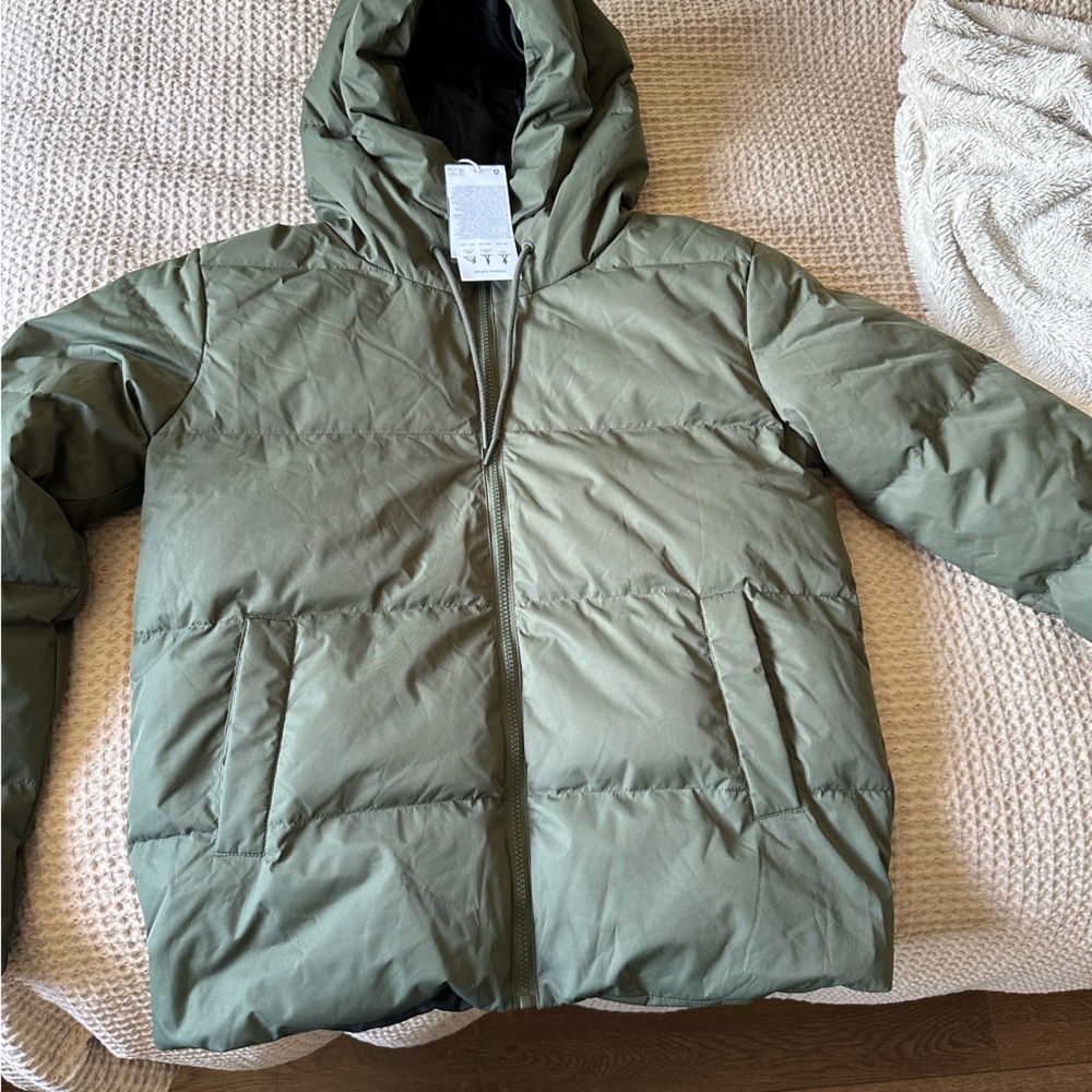 Mountain Warehouse Green Puffer Snow Jacket Never been worn.